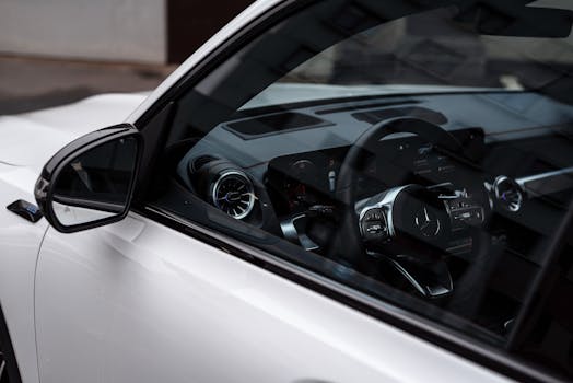 pexels-photo-17792224-17792224 Detailed view of a luxury Mercedes-Benz EQB interior showcasing the steering wheel and dashboard.